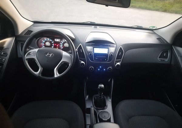 Hyundai Tucson cena 38500 przebieg: 155475, rok produkcji 2012 z Mrągowo małe 301